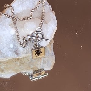 Women's 925 Chinese Symbol Ankle Bracelet. Measures 10" long.